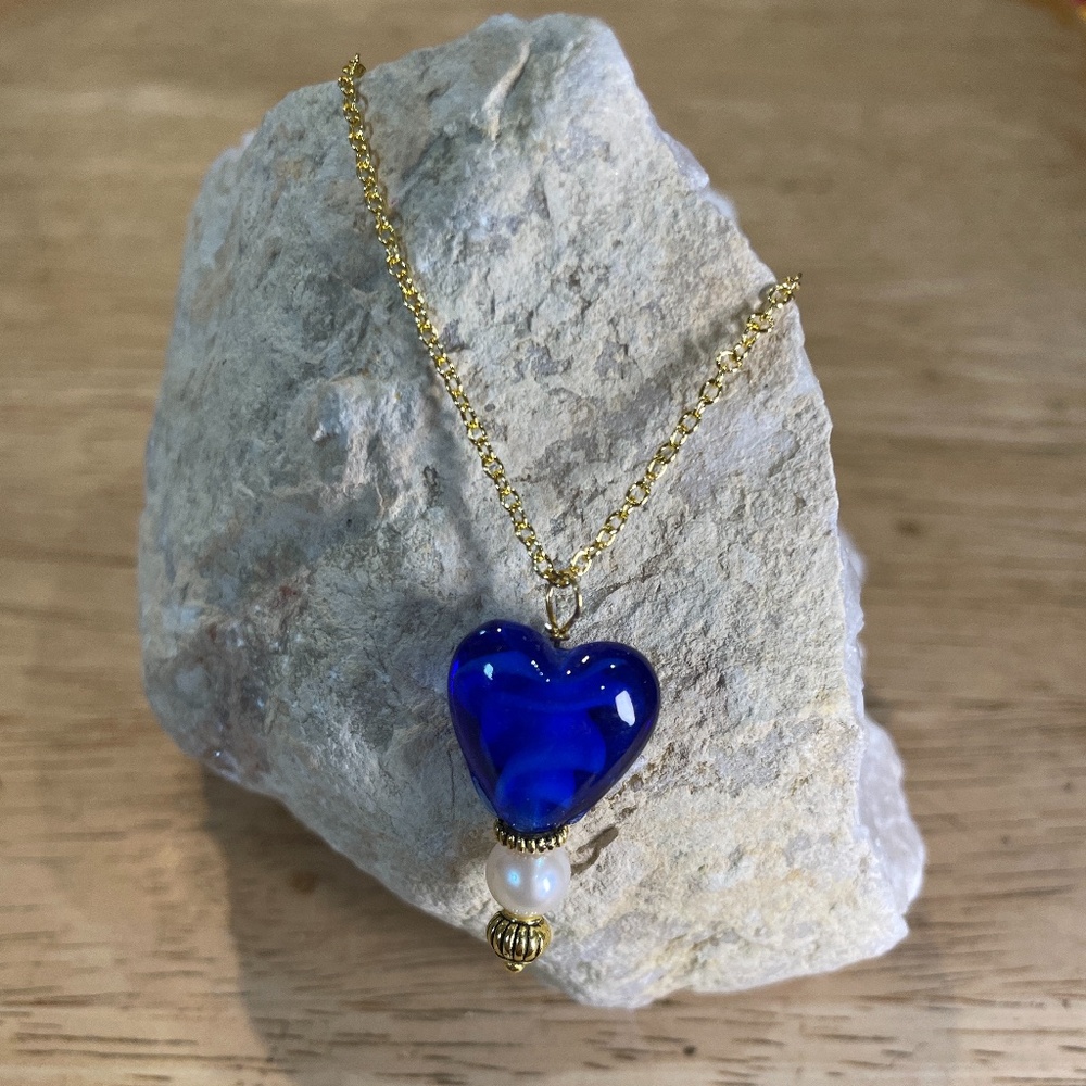 Deep blue glass heart and a fresh water pearl on 20 inch gold plated necklace